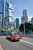 Red taxi in Central, Hong Kong Island, Hong Kong, China, Asia