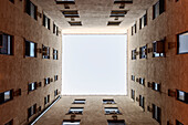 symmetrical upview of a residential building in Harlem, NYC, New York City, United States of America, USA, North America