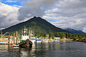 Crescent Boat harbour with beautiful wooded mountains and town of Sitka, rare sunny day, summer, Baranof Island, Alaska, United States of America, North America