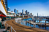 Seattle skyline on sunny day from Bell Harbor Marina, Seattle, Washington State, United States of America, North America