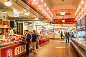 Neon lights and stalls in Farmers Market, Pike Place Market, Belltown District, Seattle, Washington State, United States of America, North America