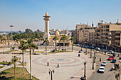 View of central square opposite Luxor temple, looking towards Ahmad Najam Mosque, Luxor, Egypt, North Africa, Africa
