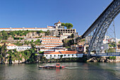 Rabelos boat on Douro River, Serra do Pilar Monstery, Ponte Dom Luis I Bridge, UNESCO World Heritage Site, Porto (Oporto), Portugal, Europe