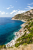 Cliffs on the blue sea, Pomonte, Marciana, Elba Island, Livorno Province, Tuscany, Italy, Europe