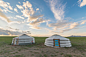 Mongolian nomadic traditional gers and clouds in the sky, Middle Gobi province, Mongolia, Central Asia, Asia