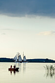 Two-master and fishing boat on the lagoon side in Lieper angle, Usedom, Baltic Sea coast, Mecklenburg-Vorpommern, Germany