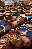 Leather tanning in Chouara Tannery in Fes, Morocco, Africa