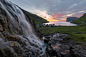 Waterfall at sunrise, Tjornuvik, Sunda Municipality, Streymoy Island, Faroe Islands, Denmark, Europe