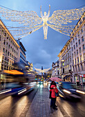 Regent Street with Christmas illuminations at twilight, London, England, United Kingdom, Europe
