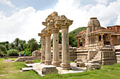 The Sas-Bahu Temples consisting of two temples and a stone archway with exquisite carvings depicting Hindu deities, near Udaipur, Rajasthan, India, Asia