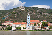 View over Danube River to Collegiate church and castle ruins, Durnstein, Wachau, Lower Austria, Europe