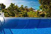 The pool of the Villa at the Lizard Island Resort is high above the ocean