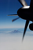 Ariel view of Northern California with propeller and engine from a Bombardier Turboprop Airliner.