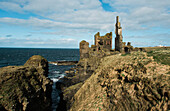 Clouds over Sinclairs Bay and stone ruins of Castle Sinclair Girnigoe, Scotland, UK