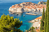 High-angle view over the old town of Dubrovnik and Banje Beach, Dubrovnik, Croatia, Europe