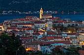 Elevated view over the old town of Korcula Town at dusk, Korcula, Croatia, Europe