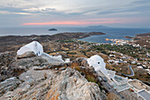 View of Livadi Bay and white Greek Orthodox churches from atop Pano Chora, Serifos, Cyclades, Aegean Sea, Greek Islands, Greece