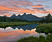 Mountain range reflected in pond, Grand Tetons, Grand Teton National Park, Wyoming