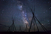 Teepee frames under the Milky Way from a Nez Perce encampment, Big Hole National Battlefield, Montana