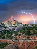 Lightning strike near rock formation, Church Rock, Red Rock State Park, New Mexico