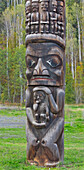 Traditional wood totem pole near Gitanyow, British Columbia, Canada