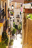 Typical street of the Santa Cruz neighborhood in Alicante, Valencia, Spain