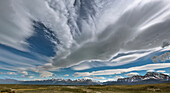 Lenticular and cumulus clouds above peaks, Fitzroy Massif, Los Glaciares National Park, Patagonia, Argentina