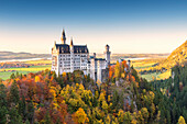 Neuschwanstein Castle in Autumn at sunset Europe, Germany, Bavaria, southwest Bavaria, Fussen, Schwangau