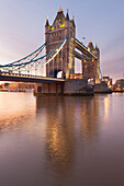 Tower Bridge at dawn reflected in river Thames, London, Great Britain, UK