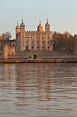 The Tower of London reflected on river Thames, London, Great Britain, UK