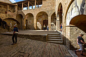 Tourists at the San Gimignano. Italy, Tuscany, Siena district.