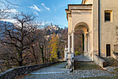 View of Santa Maria del Monte and one of the chapels of the sacred way. Sacro Monte di Varese, Varese, Lombardy, Italy.