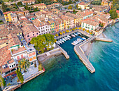 Aerial view of Villa harbour and village. Garda Lake, Brescia Province, Lombardy, Italy