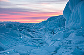 Blocks of ice on the dusk on the Lake Baikal in winter, Irkutsk region, Siberia, Russia