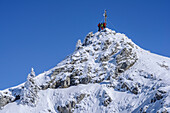 Three persons backcountry skiing standing at summit of Wildalpjoch, Wildalpjoch, Bavarian Alps, Upper Bavaria, Bavaria, Germany