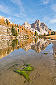 Fanes lake in Dolomites with autumnal coulors. Fanes valley, Badia Valley, Trentino, Italy.