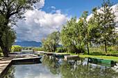 View of the Azzate harbour during a spring day. Azzate, Lago di Varese, Varese Province, Lombardy, Italy.