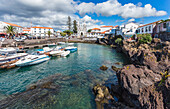 Portugal, Azores, Pico Island, Madalena, harbor view with the Igreja de Santa Madalena church