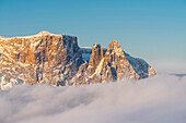 Alpe di Siusi/Seiser Alm, Dolomites, South Tyrol, Italy. The peaks of Sciliar/Schlern in the light of the sunrise