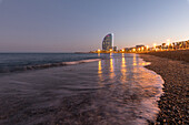 La Barceloneta Beach and the W Barcelona hotel in the background, Barcelona, Catalonia, Spain