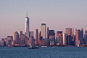 sun setting over the manhattan skyline and one world trade center, manhattan, new york city, new york, united states, usa