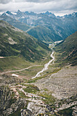 Wanderin on the ascent on the long distance hiking trai, E5, Alpenüberquerung, 4th stage, Skihütte Zams,Pitztal,Lacheralm, Wenns, Gletscherstube, Zams to  Braunschweiger Hütte, tyrol, austria, Alps