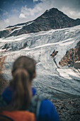 Mountaineer enjoys views of Pitztal Glacier, E5, Alpenüberquerung, 4th stage, Skihütte Zams,Pitztal,Lacheralm, Wenns, Gletscherstube, Zams to  Braunschweiger Hütte, tyrol, austria, Alps