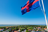 View from the old lighthouse with flag Oldenburger Land, Wangerooge, East Frisia, Lower Saxony, Germany