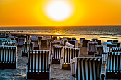 Beach chairs in the sunset, Wangerooge, East Frisia, Lower Saxony, Germany