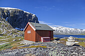 Red hut by the lake Djupvatnet in front of the mountain Djupvassegga and glacier Skjerdingdalsbreen, More and Romsdal, Fjord norway, Southern norway, Norway, Scandinavia, Northern Europe, Europe