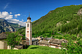 Church and village of Chialvetta with Cottian Alps in background, Chialvetta, Val Maira, Cottian Alps, Piedmont, Italy