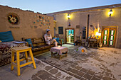 Woman in a cafe on a rooftop in Yazd, Iran, Asia