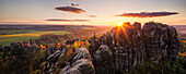 Panorama overlooking the Schrammsteine and the Elbe in the last evening light in the spring, Saxon Switzerland National Park, Saxony, Germany