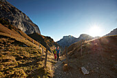 two women hiking on Gramaialm Hochleger,  Eastern Karwendel Range, Tyrol, Austria